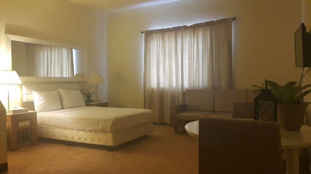 One Pacific Hotel Тамунинг Экстерьер фото